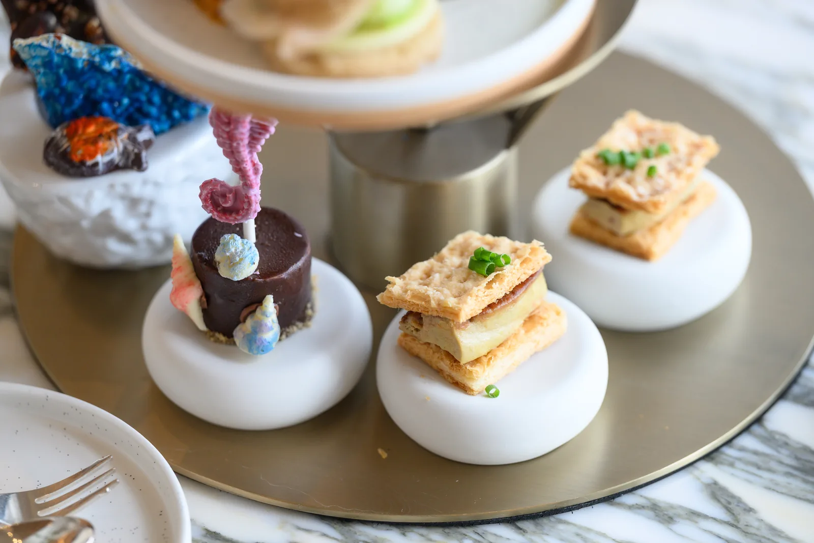 Desserts with a coral and seahorse design