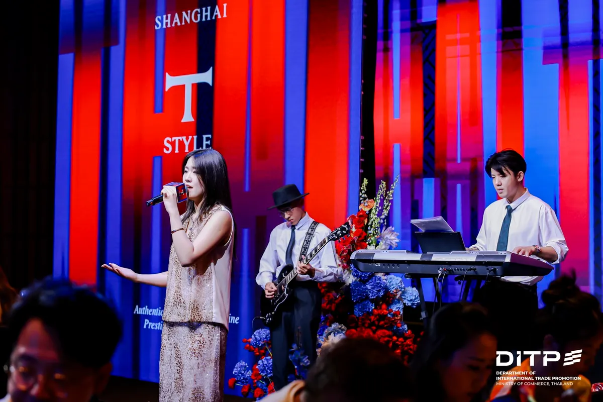 A singer and a band on stage