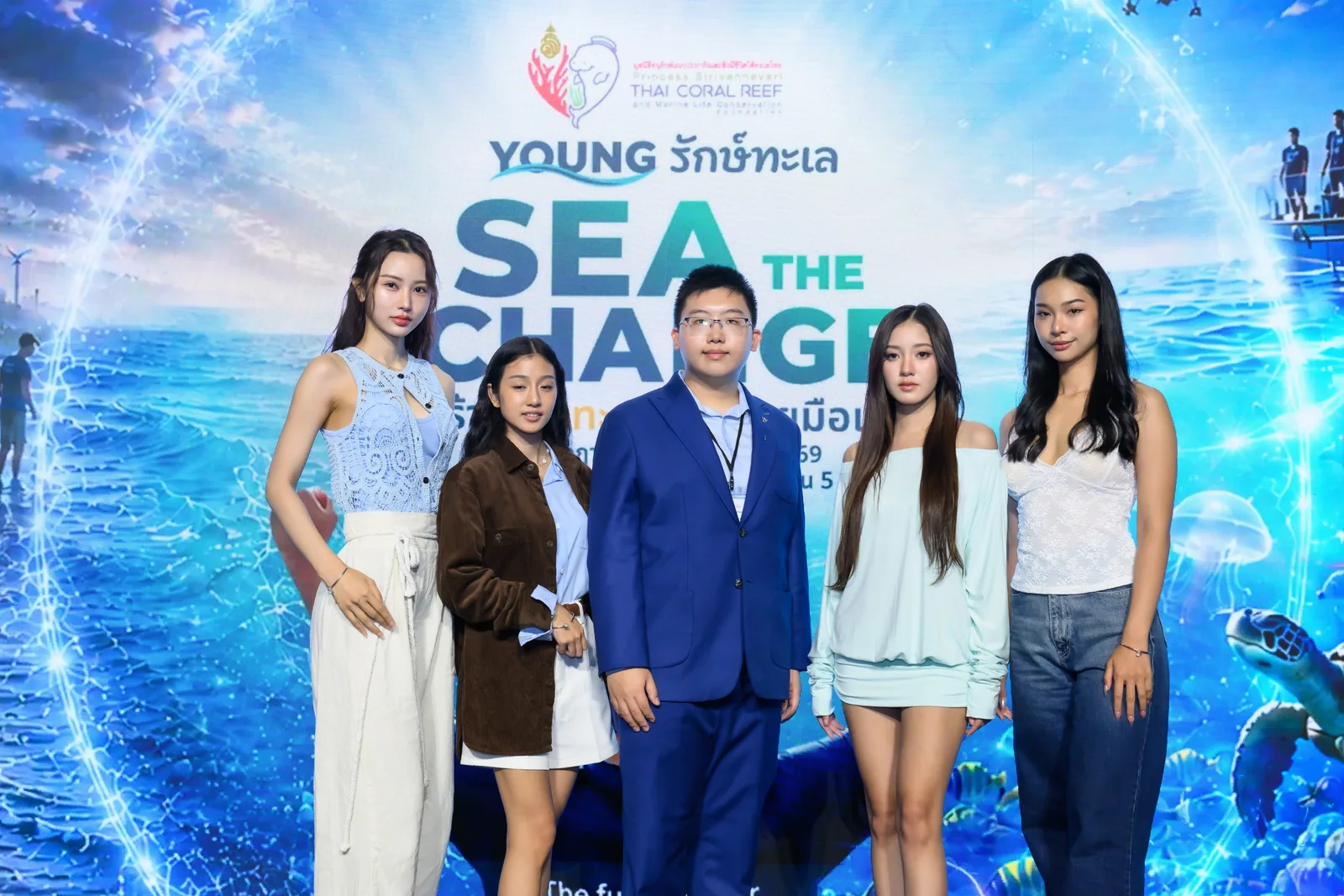 The AVALON team at the YOUNG Raksa Talay SEA THE CHANGE backdrop